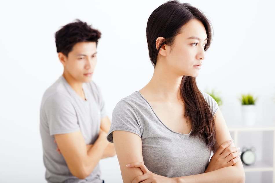picture of young Couple not talking after  fight  in living room